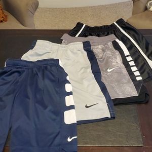 Nike lot of 4 boys shorts (one small, 3 medium)